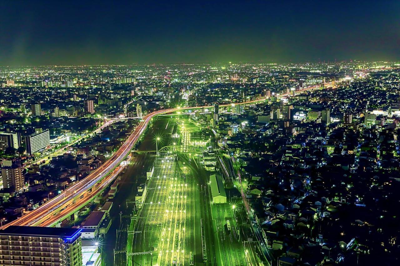 Nagoya Prince Hotel Sky Tower Экстерьер фото Aerial view of the highway at night